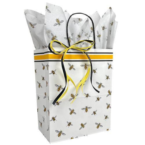 White kraft paper shopping bag scatter-printed with bees, twisted paper handles