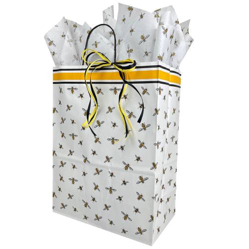 White kraft paper shopping bag scatter-printed with bees, twisted paper handles