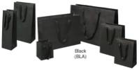 Black Manhattan shopping bags in matte uncoated paper with flat woven cotton-twill handles, shown in multiple sizes