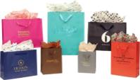 Assorted color kraft paper Brooklyn shopping bags with flat twill handles and side gussets