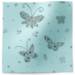 Butterfly tissue paper with ornate floral silhouettes on a soft aqua background