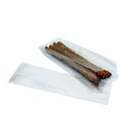 Clear cellophane side-gusset bag holding chocolate-covered pretzel rods, with an empty flat bag beside it