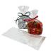 Two clear cellophane side-gusset bags of foil-wrapped chocolates and gummy candy tied with ribbon, plus an empty flat bag