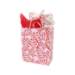 Pink Christmas tree cake paper shopping bag with white-iced red-striped tree cakes, stars and snowflakes, and white twisted-paper handles