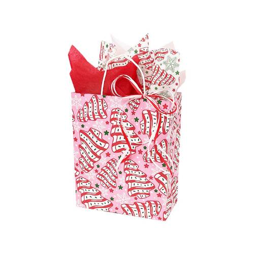 Pink Christmas tree cake paper shopping bag with white-iced red-striped tree cakes, stars and snowflakes, and white twisted-paper handles