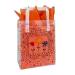 Folk-art three-flower print on a frosted clear poly shopping bag with soft loop handles — 8 x 4 x 10