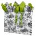 White paper shopping bag printed with a black French toile, twisted paper handles
