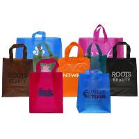 Frosted tint poly shopping bags in assorted colors with soft flexi-loop handles — 8 x 5 x 10