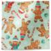 Gingerbread cookies tissue paper with illustrated gingerbread people and candy canes on soft mint