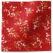 Holiday floral tissue paper with gold trailing berry and leaf vines on deep red