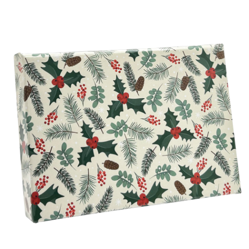 Holly Jolly gift card box shown closed — cream box printed with holly leaves, red berries, pine sprigs, pinecones and snowflakes