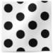 Ink spots printed tissue paper with bold black polka dots on a white background