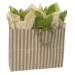 Wide kraft paper shopping bag with white vertical stripes, twisted paper handles, filled with green and floral tissue