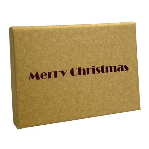 Krafty Christmas gift card box closed — natural kraft fiber box printed with bold Merry Christmas lettering in deep red