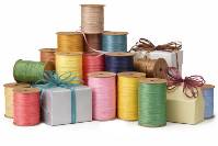 Matte wraphia rayon raffia ribbon with a soft flat finish, 1/4-inch twisted strands on a 100-yard roll, for gift wrapping and bows.