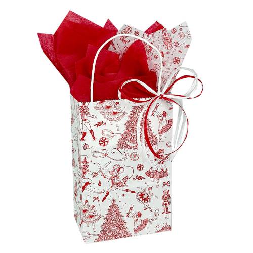 White paper shopping bag with red and black nutcracker toile Christmas print and twisted handles