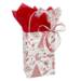 White paper shopping bag with red and black nutcracker toile Christmas print and twisted handles