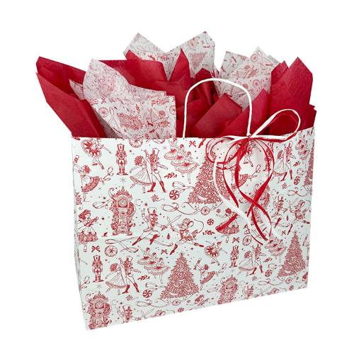White paper shopping bag with red and black nutcracker toile festive print and twisted handles