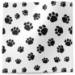 Puppy paws printed tissue paper with black paw print pattern on white background