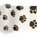 Puppy paws printed tissue paper with black paw print pattern on white background