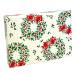Red and Green Wreath gift card box closed — white box patterned with green holly wreaths topped by bright red bows