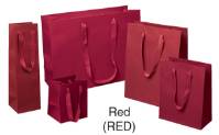 Red Manhattan shopping bags in matte uncoated paper with flat woven cotton-twill handles, shown in multiple sizes