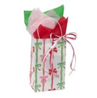 Rows of Bows Paper Shopping Bags — white kraft with repeating rows of red, green, and gold gift bows, twisted paper handles