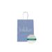 White paper shopping bag with sky blue print and twisted paper handles
