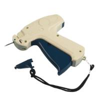 TACH-IT standard tagging gun — cream plastic body with blue trigger and metal needle, standard gauge