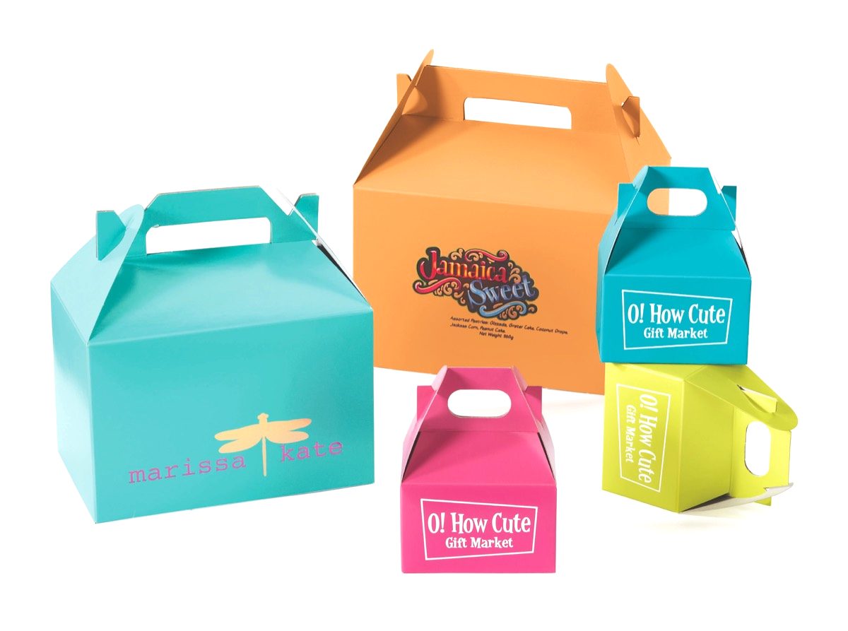 Custom printed gable boxes with built-in carry handles in teal, orange, pink, and lime