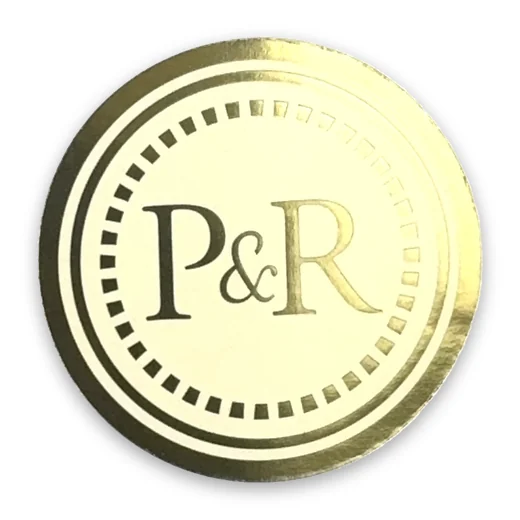 Bright gold foil circle label for P and R