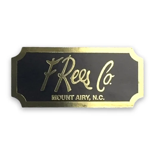 Gold foil on a black ticket notch label for F. Rees Co.