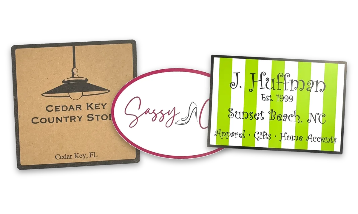 Ink printed labels supplied to customers: black ink on a kraft square, a burgundy script oval on white and green stripes on a white rectangle
