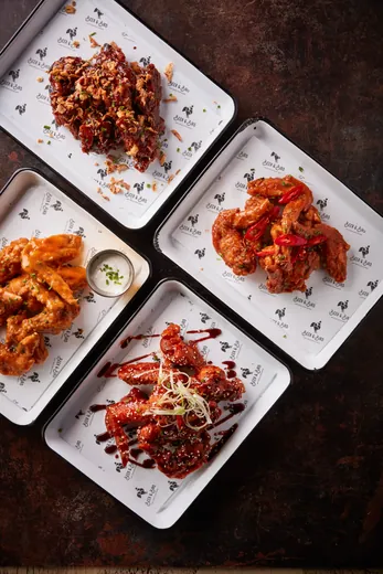 Wings served on three custom printed liner sheets