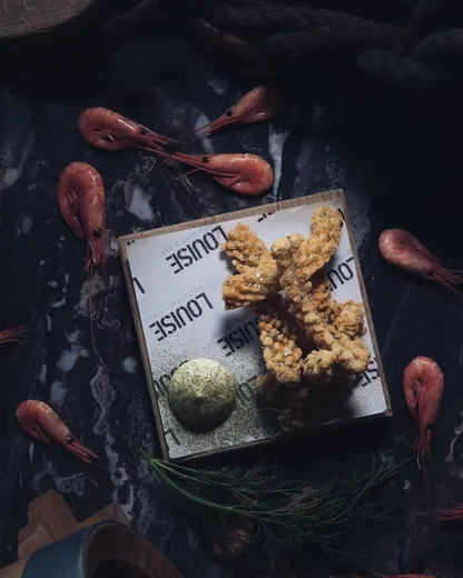 Fried seafood on custom printed deli paper