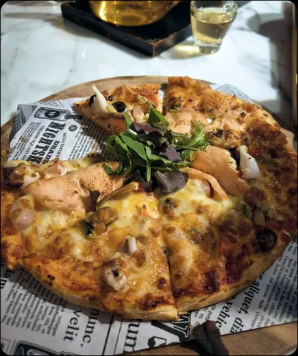 Pizza on custom printed pizza liner