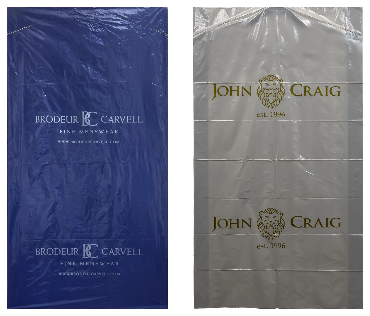 Two custom printed plastic garment bags, one navy film and one clear film, each with a menswear store logo repeated down the bag