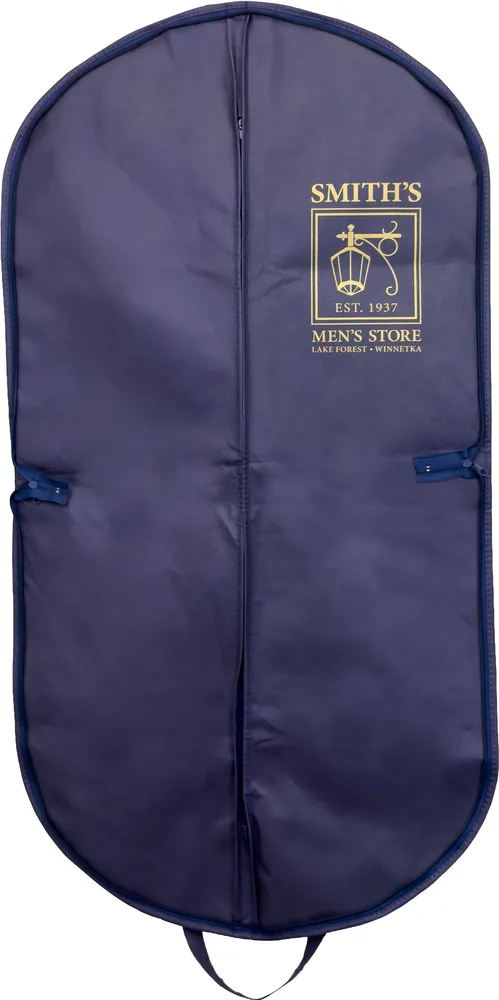 Zipper side of the same navy garment bag with a smaller gold logo beside the center zipper