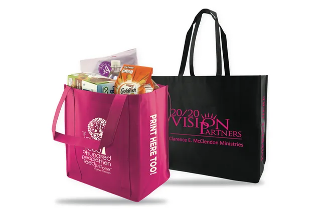Two ready made reusable tote bags printed with logos, a pink grocery tote and a black shopping tote