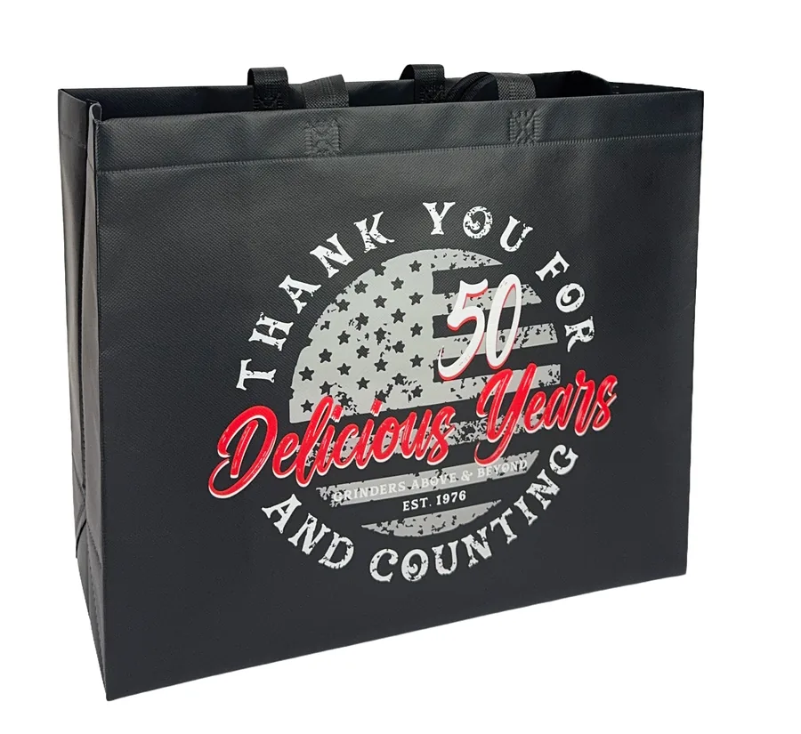 Black matte laminated tote with a two color anniversary design filling the side panel
