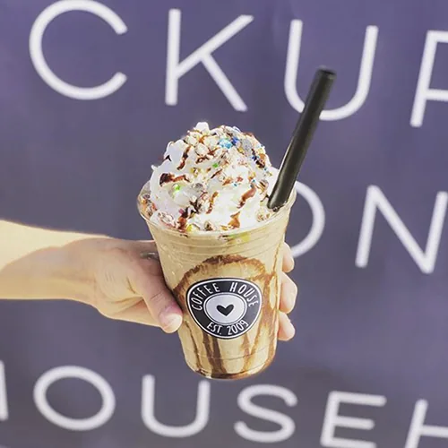 Custom printed clear plastic cup with a milkshake for a coffee house