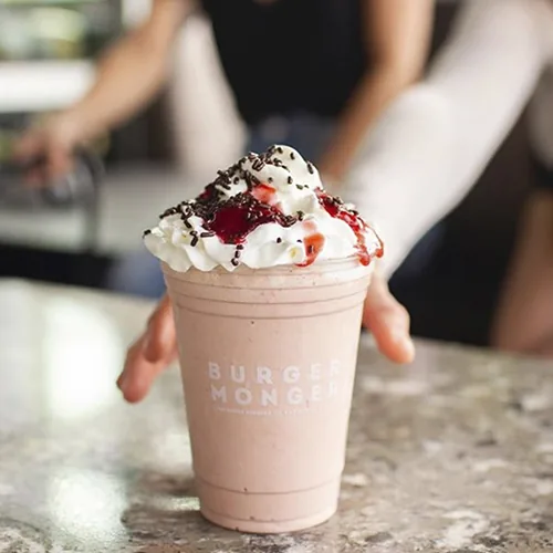 Custom printed clear plastic cup with a shake for a burger restaurant