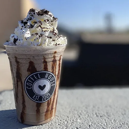 Custom printed clear plastic cup with a frozen coffee drink
