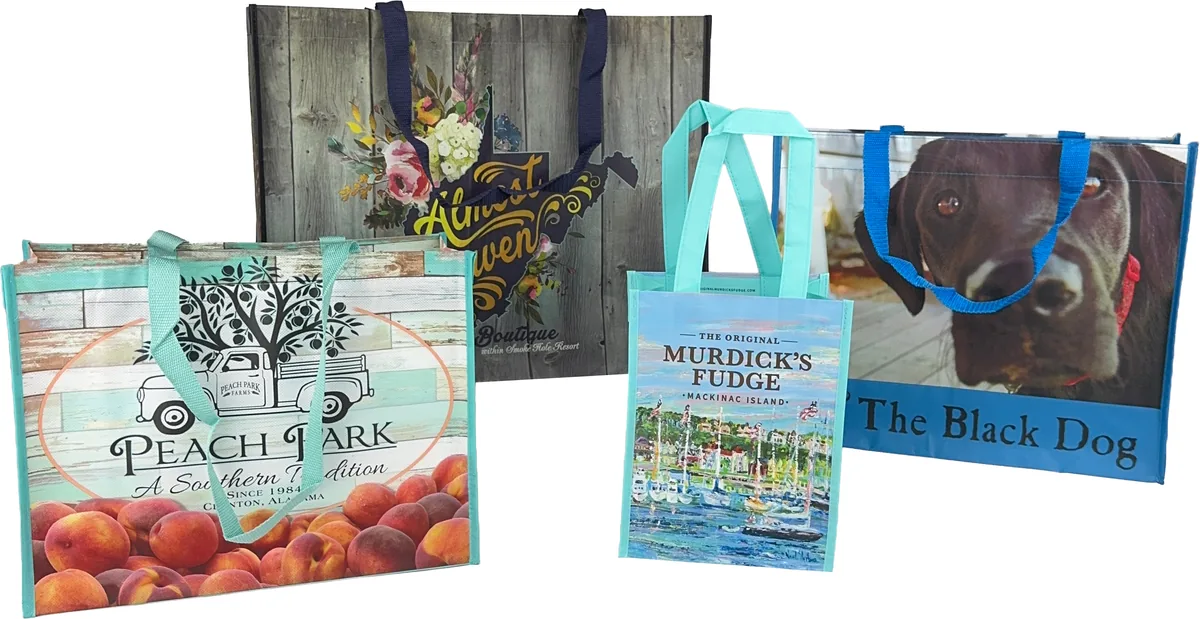 Four made to order laminated tote bags printed edge to edge in full color with photographs and patterns