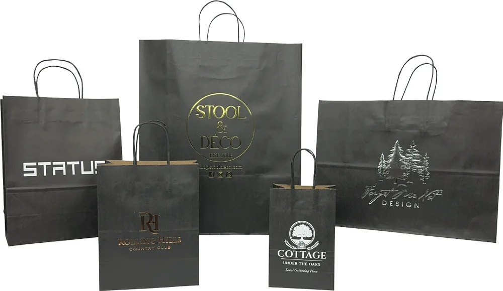 Black tint kraft shopping bags hot stamped with logos in silver, gold and white foil