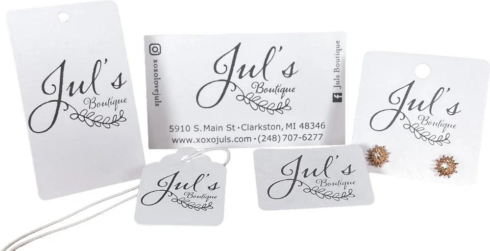 Custom string tags, hang tags, and jewelry cards printed with a boutique logo