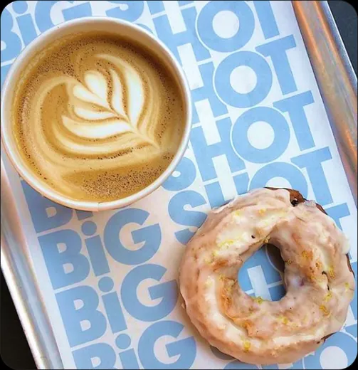 Coffee and a donut on custom printed counter paper