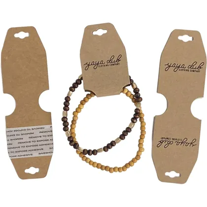 Kraft foldover bracelet cards with printed logo and adhesive strip, shown with wood bead bracelets