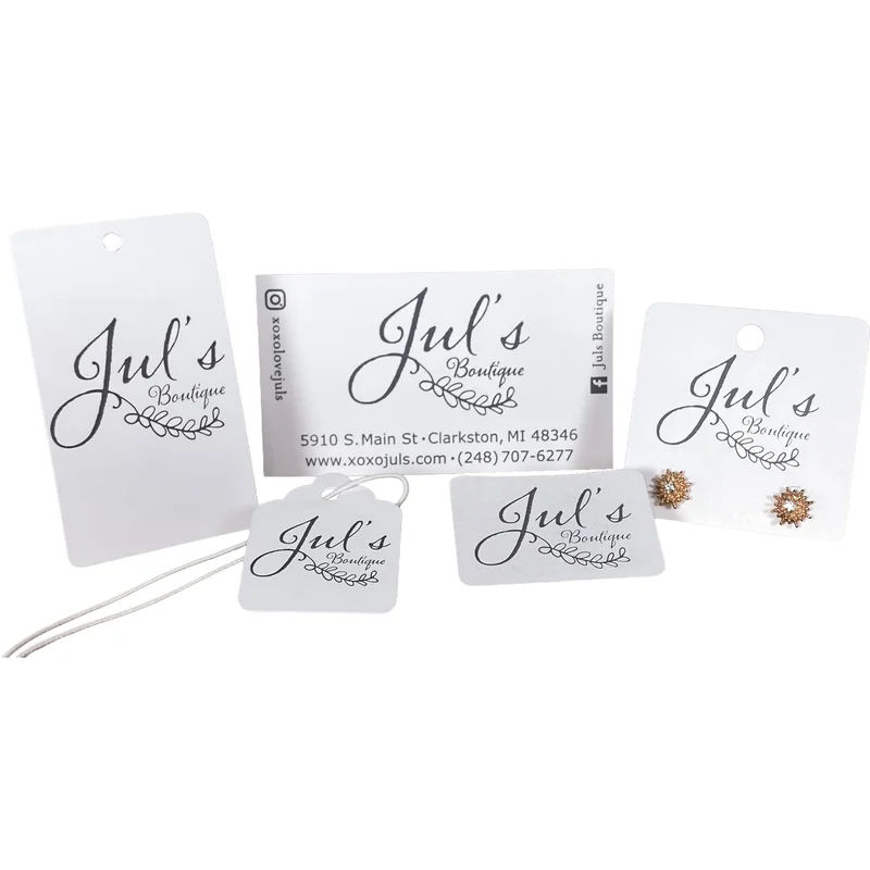 White jewelry hang tags, string tag, business cards, and earring cards with printed boutique logo